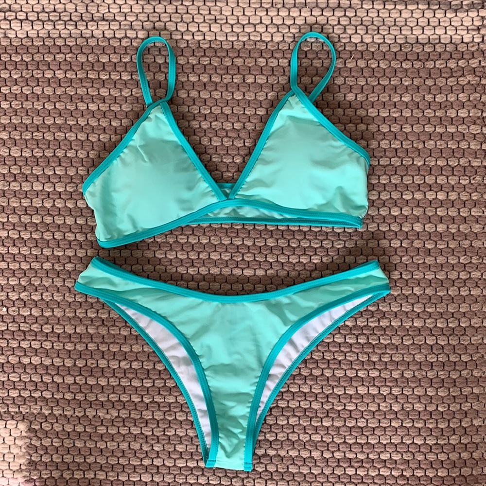 turquoise bikini that looks like oneone